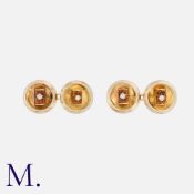 A Pair Citrine and Diamond Cufflinks in 18K yellow gold, with round faces set with baguette-cut