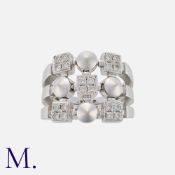 BULGARI, A Diamond Lucea Ring in 18k white gold, comprising three diamond set bands. All diamonds