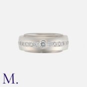 An Articulated Diamond Eternity Ring in 18k white gold, comprising two bands, one concave, and one