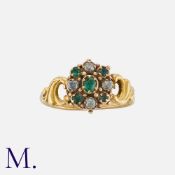 An Antique Emerald and Diamond Cluster Ring