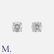 A Pair Of Diamond Stud Earrings