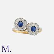 A Double Sapphire and Diamond Cluster Ring
