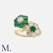 VAN CLEEF & ARPELS. An Emerald and Diamond Ring