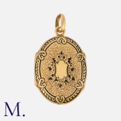An Antique Black Enamel Locket from the 19th Century in 18K yellow gold, with intricate engravings
