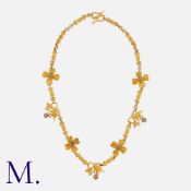 A Fancy Coloured Diamond Necklace in 18k yellow gold, comprising a series of interlocking decorative