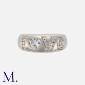 CHOPARD, A Diamond 'Love Diamonds' Ring in 18k white gold, the band set with diamonds to spell '