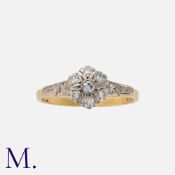 A Diamond Cluster Ring in 18k yellow gold, comprising a cluster of seven round cut diamonds, with
