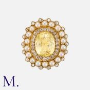 A Victorian Yellow Sapphire, Pearl And Diamond Ring in yellow gold, the principal oval cut yellow