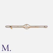 NO RESERVE - A Diamond Bar Brooch in yellow gold and platinum, set with a round cut diamond weighing
