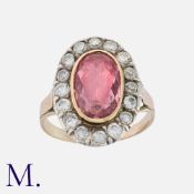 An Antique Tourmaline And Diamond Ring in yellow gold and silver, set with a principal oval cut