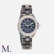CHANEL. A J12 Diamond Wristwatch in black ceramic, automatic movement, the circular black dial