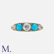 A Turquoise And Diamond Five Stone Ring in 18k yellow gold, set with a principal old cut diamond