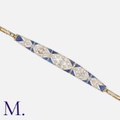 A Sapphire and Diamond Bracelet in yellow and white gold, set with three old cut diamonds, rose
