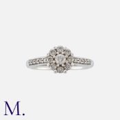 A Diamond Cluster Ring in 9K white gold, set with round cut diamonds weighing approx. 0.50ct in