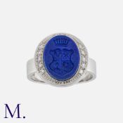 A Lapis Lazuli and Diamond Signet Ring set in 18K white gold, with carved intaglio in lapis lazuli