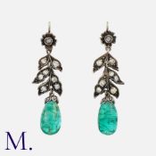 A Pair Of Emerald And Diamond Drop Earrings in yellow gold and silver, each comprising an
