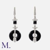 A Pair Of Onyx And Diamond Drop Earrings in 18k white gold, of geometric design, each set with a