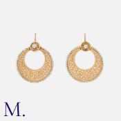 A Pair Of Pearl Earrings in yellow gold, each comprising an artuculated pearl top, suspending fine