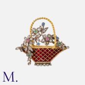 An Antique Giardinetto Brooch in yellow gold and silver. Designed as a basket of flower, set with