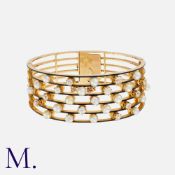 An Antique, Enamel, Old Cut Diamond And Pearl Bangle in yellow gold, comprising six black