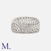 CARTIER. A Nouvelle Vague Diamond Ring in 18k white gold, the openwork lattice form, set with