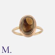 A Cameo Ring in yellow gold, set with a carved cameo depicting a woman in profile. Unmarked, tests