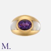 MAUBOUSSIN, A Mother of Pearl and Amethyst Ring MAUBOUSSIN, 18 carat yellow gold, the fluted, set
