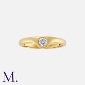 A Diamond Gypsy Ring in 18K yellow gold set with a round brilliant cut diamond weighing approx. 0.