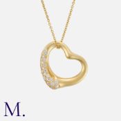 TIFFANY & Co. A Diamond Open Heart Pendant and Chain by Elsa Peretti for Tiffany. Pave set with