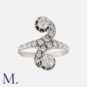 An Art Deco Diamond Toi et Moi Ring in 18K white gold, set with two principal old cut diamonds