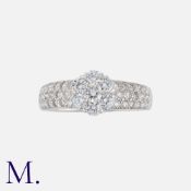Van Cleef & Arpels, A 'Fleurette' Diamond Ring in 18 carat white gold, comprising a central floral