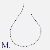 CARTIER. A Sapphire and Diamond Line Necklace in 18K white gold set with vari-cut blue sapphires