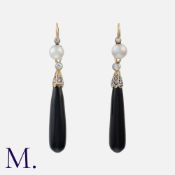 A Pair of Pearl, Onyx and Diamond Drop Earrings in yellow and white gold, each comprising a pearl