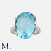 A Topaz Ring in white gold, set with a blue topaz weighing approximately 10.8ct. Unmarked; tests