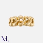 VAN CLEEF & ARPELS. A Gold Heart Band in 18K yellow gold, with graduating stylised openwork hearts