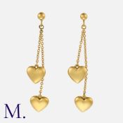 TIFFANY & Co. A Pair of Heart Drop Earrings in 18K yellow gold with two hearts suspended on