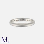 CARTIER. A Platinum Band signed Cartier and serial numbered. Marked PT950 for platinum. Size: K1/