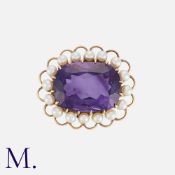 An Amethyst and Pearl Brooch in 9K yellow gold, set with a good-sized deep purple amethyst (