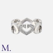 CARTIER. A Diamond Heart Ring in 18K white gold, with alternating heart pattern, one motif set