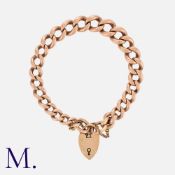 An Antique Curb Bracelet in 9K rose gold. Secured with heart-shaped padlock. Marked '375' for 9ct