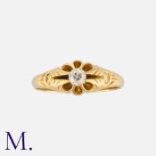 An Antique Diamond Gypsy Ring in 18k yellow gold set with a single old cut diamond weighing