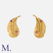 GEORGES LENFANT for HERMÈS, A Pair of Ruby Earclips in 18 carat yellow gold, each designed as a