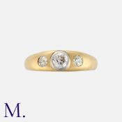 An Old Cut Diamond Gypsy Three Stone Ring in 18 carat gold, set with three old cut diamonds
