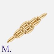 CARTIER. A Gentiane Brooch in 18K yellow gold. Signed Cartier 1989 and serial numbered. Marks for