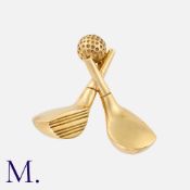 HERMES. A Gold Golf Brooch in 18K yellow gold in the form of two golf clubs and golf ball. Signed