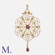 An Antique Suffragette Pendant and Chain in 15K yellow gold in a pleasant star and flower form,