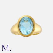 An Aquamarine Ring in 18 carat gold, set with an oval cut aquamarine of approximately 3.20 carats.