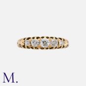 An Old Cut Diamond Five Stone Ring in 18k yellow gold, set with five graduated old cut diamonds