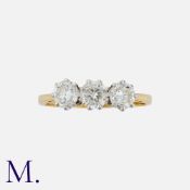A Diamond 3-Stone Ring in 18ct yellow and white gold set with three round brilliant diamonds