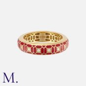 An Enamel And Diamond Ring in 18 carat yellow gold, of geometric design, decorated with red enamel